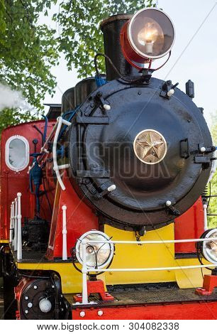 Old Soviet Steam Locomotive Blowing Off The Steam Out Of The Whistle