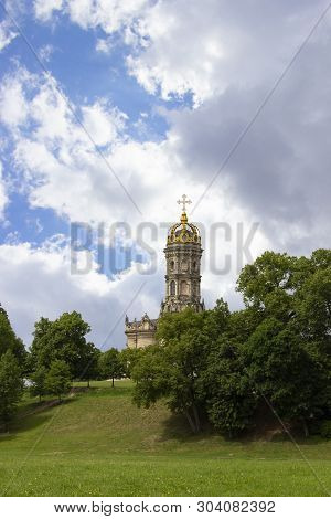 Stone Temple With A High Belfry, One Golden Dome And A Golden Christian Cross On Top. Beautiful Maje