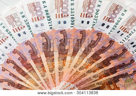 Russian Rubles Are On A Homogeneous Background, Bills Five Thousand Rubles, Money Fan