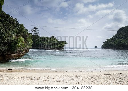Beautiful Sea Wave At Tiga Warna Beach In Malang, East Java, Indonesia. Beautiful Beach Landscape.
