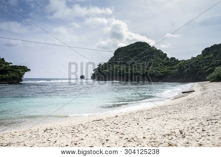 Beautiful Sea Wave At Tiga Warna Beach In Malang, East Java, Indonesia. Beautiful Beach Landscape.