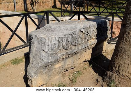 The Element Of The Gate Of Hadrian On The Ground Near The Gate. Ruins Of Ancient Construction. Hadri