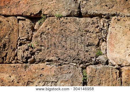 The Wall Near The Gate Of Hadrian, The Texture Of The Stone Walls Of Ancient Stone Blocks. Hadrians 