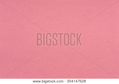 Paper Texture In Light Elegant Scarlet Color Close-up. Scarlet Paper Background.