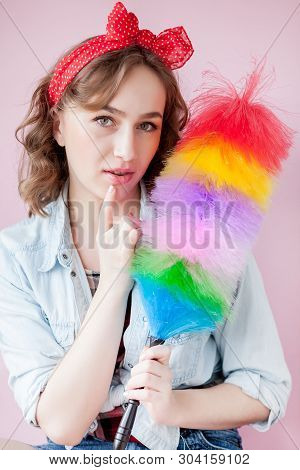 Cleaning Pin Up Woman. Smiling Pinup Girl Holds Colorful Duster Brush. Cleaning Service. Pin-up Girl