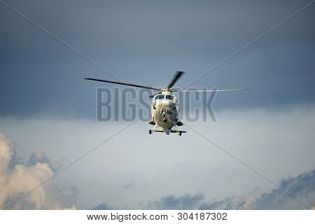 Phuket, Thailand - April 28, 2019: White Sikorsky S-76b Helicopter Of Royal Thai Navy Fly Over The S