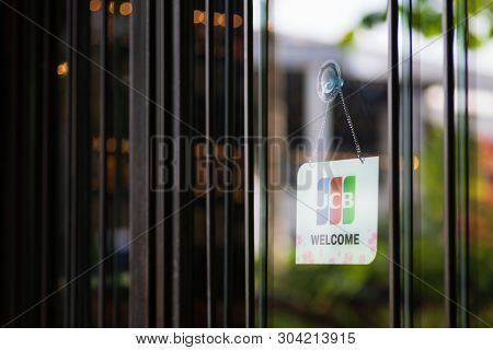 Bangkok, Thailand - May 26, 2019: Jcb Credit Cards And Welcome Sign Hangs In Front Of A Shopping Sto