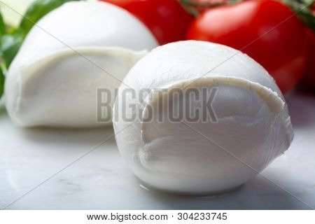 Balls Of Buffalo Mozzarella, Soft Italian Scheese Made From The Milk Of Italian Mediterranean Buffal