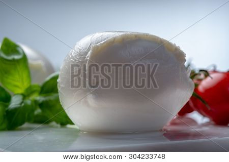 Balls Of Buffalo Mozzarella, Soft Italian Scheese Made From The Milk Of Italian Mediterranean Buffal