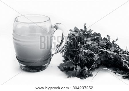 Fresh Parsley Juice  Or Coriander Juice In A Transparent Glass Isolated On White With Fresh Parsley