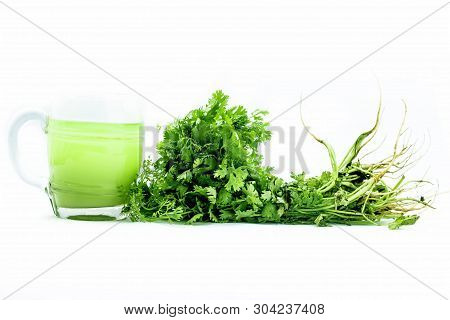 Fresh Parsley Juice  Or Coriander Juice In A Transparent Glass Isolated On White With Fresh Parsley 