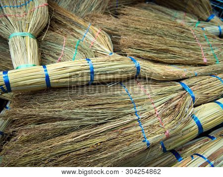 A Lot Of Knitted Brooms Made From Plant Materials