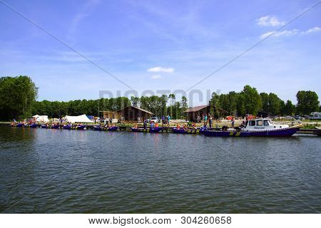 Almere, The Netherlands - June 1, 2019: Row Of Dutch Sea ​​scouts Boats.