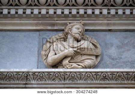 LUGANO, SWITZERLAND - JUNE 24, 2018: Prophet Josephus, relief on the portal of the Cathedral of Saint Lawrence in Lugano, Switzerland