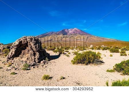 View Of The High Altitude Volcano Tunupa At The Edge Of The Uyuni Salt Flat In Boliviat