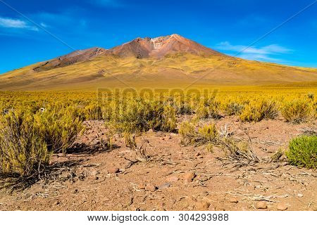 Volcanic Landscape At Uyunu In Bolivia With The Dormant Tunupa Volcano