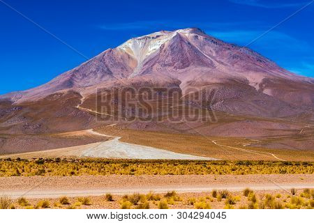 View Of The Water Flowing Down From The Beautiful Crater Of The Dormant Tunupa Volcano In Uyuni Boli