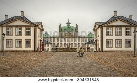 Fredensborg, Denmark - May 18, 2019: Fredensborg Palace Is A Palace Located On The Eastern Shore Of 
