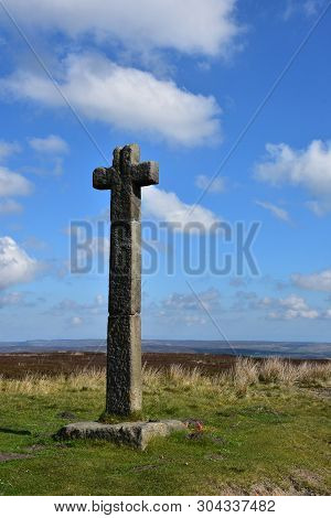 Large Memorial Stone Cross Waymarker On The Moors In England.