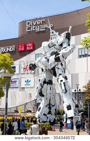 Tokyo, Japan - April 28, 2019, The Unidentified Traveler Look At Rx-0 Unicorn Gundam Statue In Norma