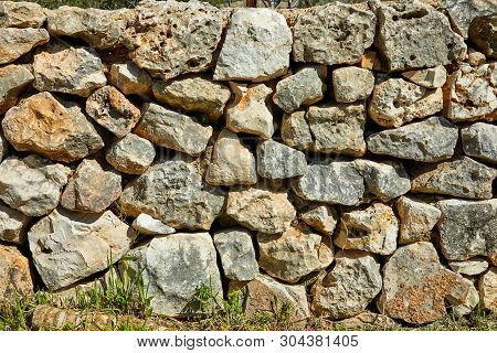 Forest Of Sataf West Of Jerusalem. Stone Wall Background Texture.