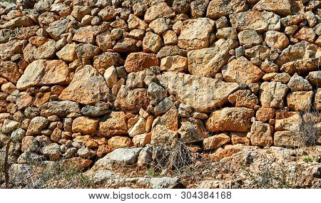 Forest Of Sataf West Of Jerusalem. Stone Wall Background Texture.