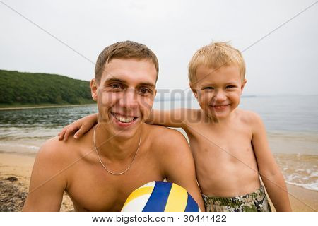 The uncle and the nephew.On a background of the sea.