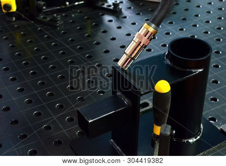 The Arm Welding Robot Machine For Welding Metall Part. Modern Manufacturing Process