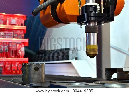 Cnc Laser Plasma Cutting Head, Close-up. Modern Technology In Process At Metalworking Manufacturing