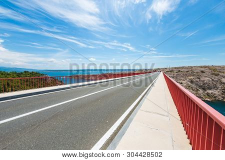 Red Bridge Over The Canyon In Croatia. View From The Bridge To The Canyon In The Krka National Park.