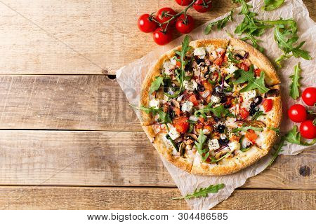 Vegetable Italian Pizza With Tomatos On Wodeen Background, Copy Space, Top View
