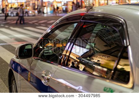 Tokyo, Japan, May 16, 2019 : Taxi In The Lights Of Ueno By Night. The Greater Tokyo Area Is Ranked A