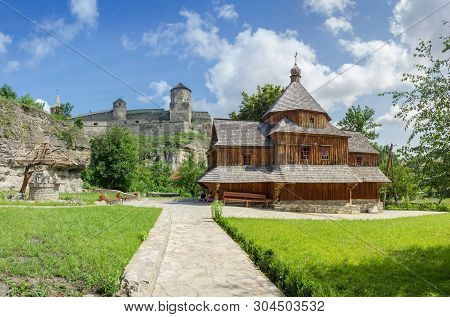 Wooden Exaltation Of The Holy Cross Church 18th Century At The Foot Of The Mediaeval Fortress. Kamia