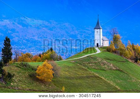 Slovenia, Autumn Panorama With Saints Primus And Felician Church On Top Of Hill In Slovenian Country