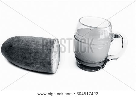 Raw Organic Lauki Or Bottle Gourd Isolated On White With Its Extracted Juice In A Glass Also.
