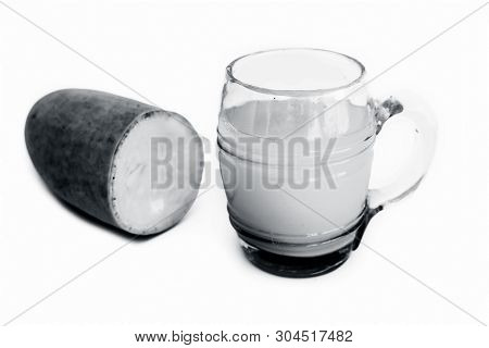 Raw Organic Lauki Or Bottle Gourd Isolated On White With Its Extracted Juice In A Glass Also.