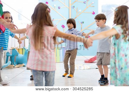 Little Children Roundelay On Lesson In Kindergarten