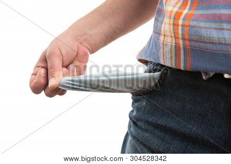 Closeup Of Empty Pants Or Trousers Jeans Pocket Presented By Man As Moneyless Concept Isolated On Wh
