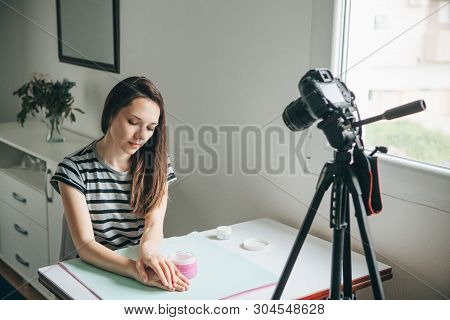 Girl Videoblogger Or Beauty Blogger Records Video For Subscribers How To Use The Cream And Talks Abo