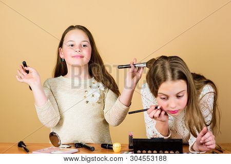 Children Little Girls Make Up Face. Makeup Store. Experimenting With Style. Creativity Is Best Makeu