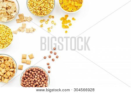 Cereals, Oatflakes And Cornflakes For Healthy Breakfast On White Background Top View Mock Up