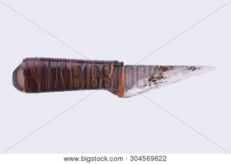 Old Rusty Knife Isolated On White Background. Dirty Knife With Rubber Handle, Horizontal Image.