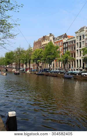 Keizersgracht Canal In Amsterdam, Netherlands. Canalside Architecture.