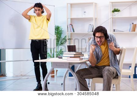 Two male students in the classroom