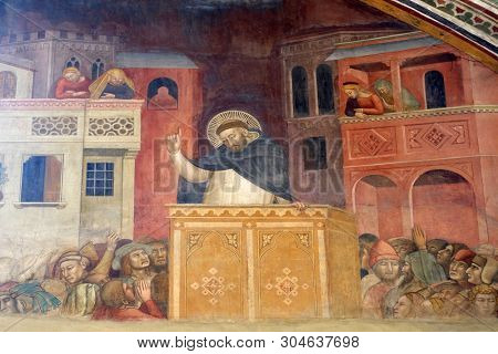FLORENCE, ITALY - JANUARY 10, 2019: Preaching of Saint Peter, fresco by Andrea di Bonaiuto in Spanish Chapel, Santa Maria Novella Principal Dominican church in Florence, Italy