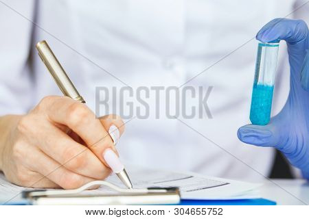 Scin Care. Scientist Hands Testing Texture Of Beauty Products