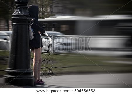 The Girl The Prostitute Costs Waiting For The Client, On The Street In The Afternoon