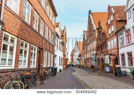 Luneburg, Germany - November 06, 2018: Street With Medieval Old Brick Buildings In Luneburg