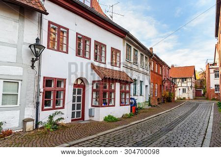 Luneburg, Germany - November 06, 2018: Street With Medieval Old Brick Buildings In Luneburg