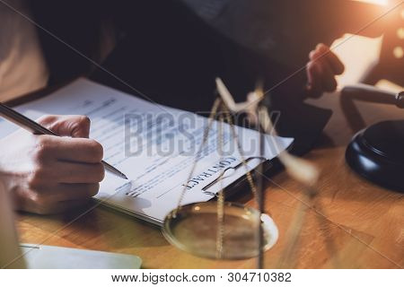Law Concept, Lawyer Woman Hoding Pen With Contract Or Agreement Document To Customer For Signing In 